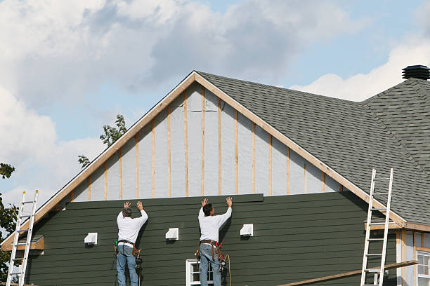 Professional Vinyl Siding technician working in Needham Heights, MA